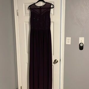 Floor length dark purple dress with sheer top